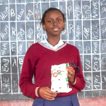 SAG Kit Distribution image showing Kaiguri Secondary School girls receiving 102 kits in Kaiguri, Kenya on Aug 26, 2022