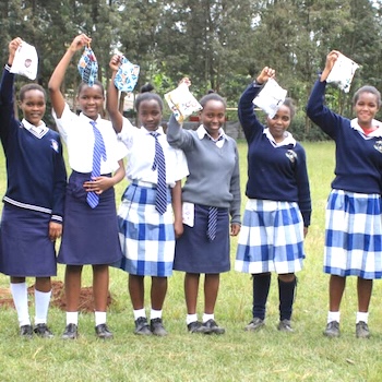 SAG Kit Distribution image showing Kiamwathi Secondary School girls receiving 400 kits in Kiamwathi, Kenya on Sep 14, 2022
