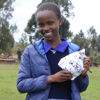 SAG Kit Distribution image showing Kariguini Primary School girls receiving 80 kits in Kariguini, Kenya on Sep 15, 2022