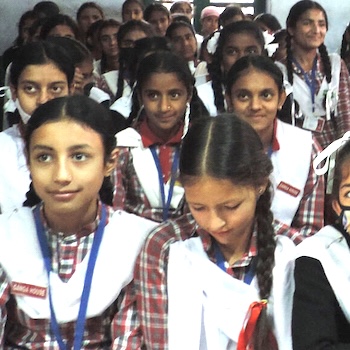SAG Kit Distribution image showing Ghaniyara girls receiving 105 kits in Dharamshala, India on Nov 4, 2022