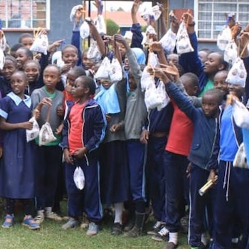 SAG Kit Distribution image showing Garishon Primary School girls receiving 285 kits in Nanyuki, Kenya on Nov 8, 2022