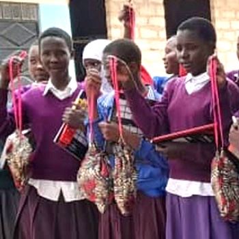 SAG Kit Distribution image showing Kimotoro Primary School girls receiving 50 kits in Kimotoro, Tanzania on Nov 24, 2022