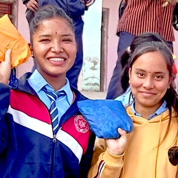 SAG Kit Distribution image showing Shree School girls receiving 500 kits in Saudiyar, Nepal on Dec 14, 2022