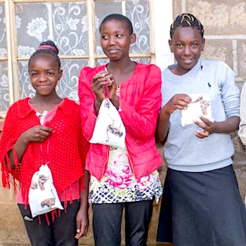 SAG Kit Distribution image showing Likii-Nanyuki Community girls receiving 1523 kits in Laikipia, Kenya on Dec 16, 2022