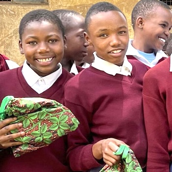 SAG Kit Distribution image showing Nyorit Primary School girls receiving 52 kits in Loiborsoit, Tanzania on Jan 27, 2023