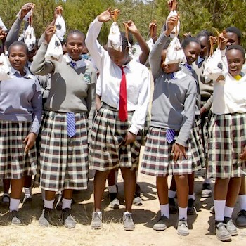 SAG Kit Distribution image showing Nkando Secondary School girls receiving 142 kits in Nanyuki, Kenya on Feb 17, 2023