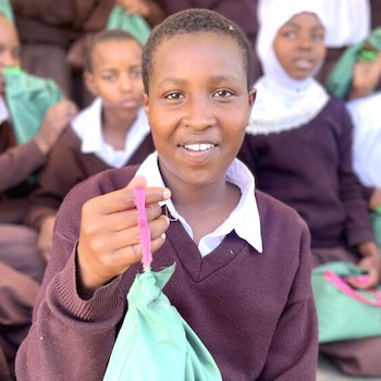 SAG Kit Distribution image showing Engeno Secondary School girls receiving 75 kits in Sakuro, Tanzania on Mar 6, 2023