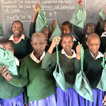 SAG Kit Distribution image showing Sakuro Primary School girls receiving 54 kits in Sakuro, Tanzania on Mar 6, 2023