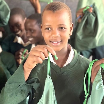 SAG Kit Distribution image showing Sakuro Primary School girls receiving 54 kits in Sakuro, Tanzania on Mar 6, 2023