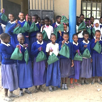 SAG Kit Distribution image showing Simanjiro Primary School girls receiving 100 kits in Emboreet, Tanzania on Mar 24, 2023