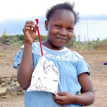 SAG Kit Distribution image showing Tetu Primary School girls receiving 92 kits in Nanyuki, Kenya on Mar 24, 2023