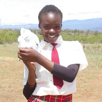 SAG Kit Distribution image showing Daiga Primary School girls receiving 126 kits in Daiga, Kenya on Apr 5, 2023