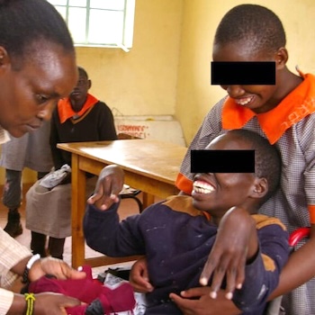 SAG Kit Distribution image showing Likii Special School girls receiving 132 kits in Likii, Kenya on Apr 14, 2023