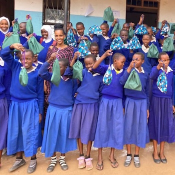 SAG Kit Distribution image showing Terrat Primary School girls receiving 92 kits in Terrat, Tanzania on May 5, 2023