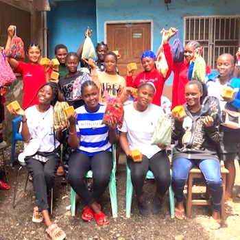 SAG Kit Distribution image showing Bolifamba High School girls receiving 17 kits in Buea, Cameroon on May 13, 2023