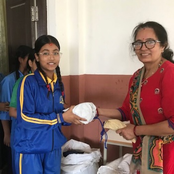 SAG Kit Distribution image showing Geetamata Secondary School girls receiving 200 kits in Swyambhu, Nepal on May 15, 2023