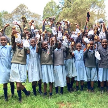 SAG Kit Distribution image showing Rititi Primary School girls receiving 75 kits in Rititi, Kenya on May 19, 2023