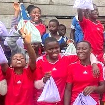 SAG Kit Distribution image showing Ndongo Primary School girls receiving 80 kits in Buea, Cameroon on May 25, 2023