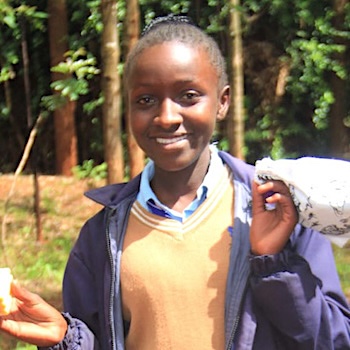 SAG Kit Distribution image showing Kalalu Secondary girls receiving 135 kits in Umande, Kenya on May 26, 2023