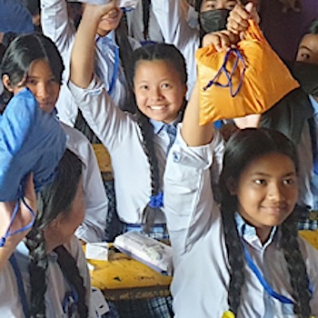 SAG Kit Distribution image showing Balbikash Boarding School girls receiving 76 kits in Budhanilkantha, Nepal on Jul 7, 2023