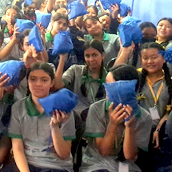 SAG Kit Distribution image showing Gyan Niketan Secondary School girls receiving 109 kits in Sankhamul, Nepal on Jul 21, 2023