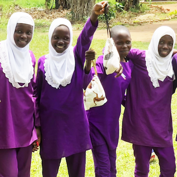 SAG Kit Distribution image showing Kaswa Muslim Primary School girls receiving 44 kits in Luwero, Uganda on Aug 22, 2023