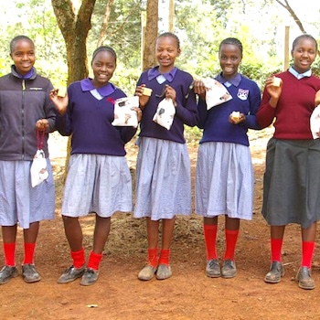 SAG Kit Distribution image showing Kamune Primary School girls receiving 256 kits in Kamune, Kenya on Sep 1, 2023