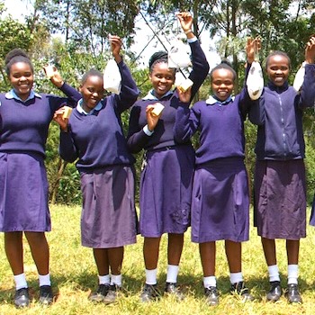 SAG Kit Distribution image showing Kamune Secondary School girls receiving 135 kits in Kamune, Kenya on Sep 1, 2023