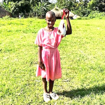 SAG Kit Distribution image showing Balitta Lwogi Primary girls receiving 71 kits in Kasana Luwero, Uganda on Sep 26, 2023