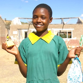 SAG Kit Distribution image showing Doldol Primary School girls receiving 235 kits in Laikipia, Kenya on Oct 6, 2023