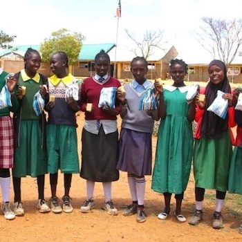 SAG Kit Distribution image showing Leikeji Primary School girls receiving 91 kits in Laikipia, Kenya on Oct 6, 2023