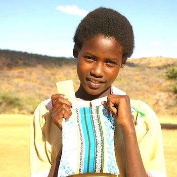 SAG Kit Distribution image showing Saramba Primary School girls receiving 85 kits in Laikipia, Kenya on Oct 6, 2023
