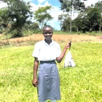 SAG Kit Distribution image showing Legacy Christian Secondary School girls receiving 67 kits in Kubamitwe, Uganda on Oct 19, 2023