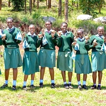SAG Kit Distribution image showing Njengu Secondary School girls receiving 60 kits in Mweiga, Kenya on Oct 23, 2023