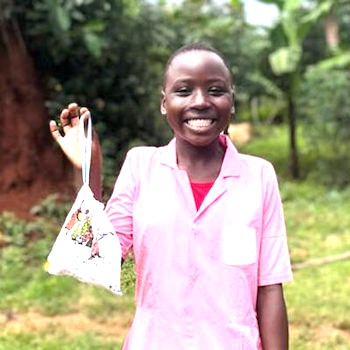 SAG Kit Distribution image showing Kabule Catholic School girls receiving 60 kits in Kabule, Uganda on Nov 4, 2023