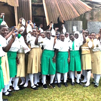 SAG Kit Distribution image showing Kabule Township Secondary School girls receiving 44 kits in Kabule, Uganda on Nov 4, 2023