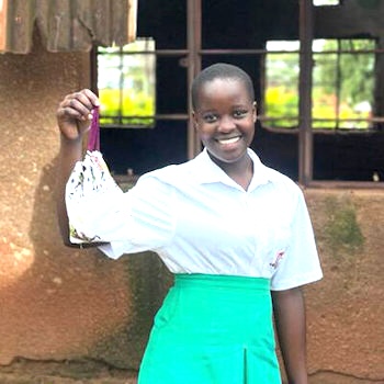 SAG Kit Distribution image showing Kabule Township Secondary School girls receiving 44 kits in Kabule, Uganda on Nov 4, 2023
