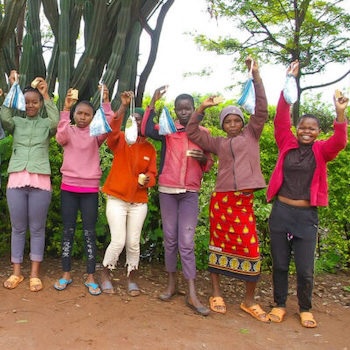 SAG Kit Distribution image showing Gitegi Girls + Salvation Army girls receiving 201 kits in Gitegi, Kenya on Nov 8, 2023