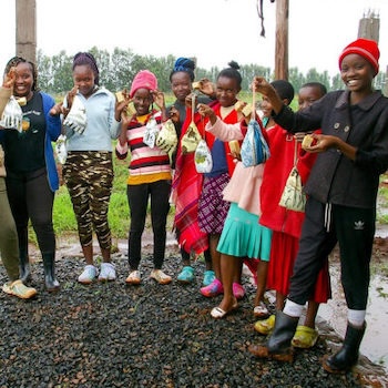 SAG Kit Distribution image showing Four Area Schools girls receiving 246 kits in Marurumu, Kenya on Nov 8, 2023
