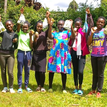 SAG Kit Distribution image showing Mairoini Area Girls girls receiving 275 kits in Mairoini, Kenya on Nov 15, 2023