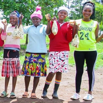 SAG Kit Distribution image showing Murinduko Secondary School girls receiving 213 kits in Mwea, Kenya on Nov 20, 2023