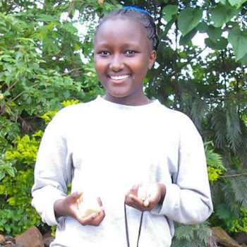SAG Kit Distribution image showing Mugamba Ciura girls receiving 326 kits in Mwea, Kenya on Nov 20, 2023