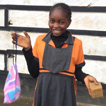 SAG Kit Distribution image showing Berthel Primary School girls receiving 78 kits in Mile 14, Cameroon on Nov 21, 2023