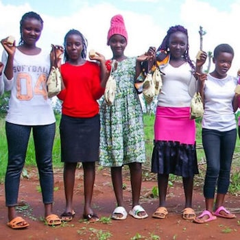 SAG Kit Distribution image showing Itanga Secondary School girls receiving 151 kits in Mwea, Kenya on Nov 22, 2023
