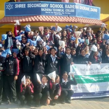 SAG Kit Distribution image showing Shree Rajhena School girls receiving 291 kits in Ghorahi, Nepal on Dec 13, 2023