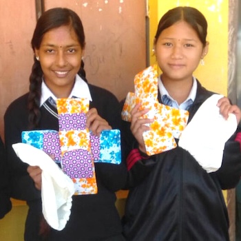 SAG Kit Distribution image showing Shree Rajhena School girls receiving 291 kits in Ghorahi, Nepal on Dec 13, 2023