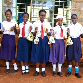 SAG Kit Distribution image showing Kiaguthu Secondary School girls receiving 82 kits in Kiria-ini, Kenya on Jan 19, 2024