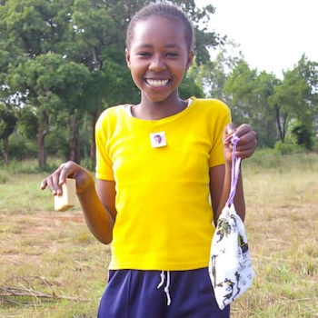 SAG Kit Distribution image showing Mumbuini Primary School girls receiving 155 kits in Mumbuini, Kenya on Jan 23, 2024