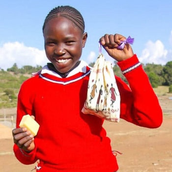 SAG Kit Distribution image showing Chumvi Primary School girls receiving 257 kits in Timau, Kenya on Feb 7, 2024