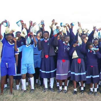 SAG Kit Distribution image showing Chumvi Secondary School girls receiving 245 kits in Timau, Kenya on Feb 7, 2024